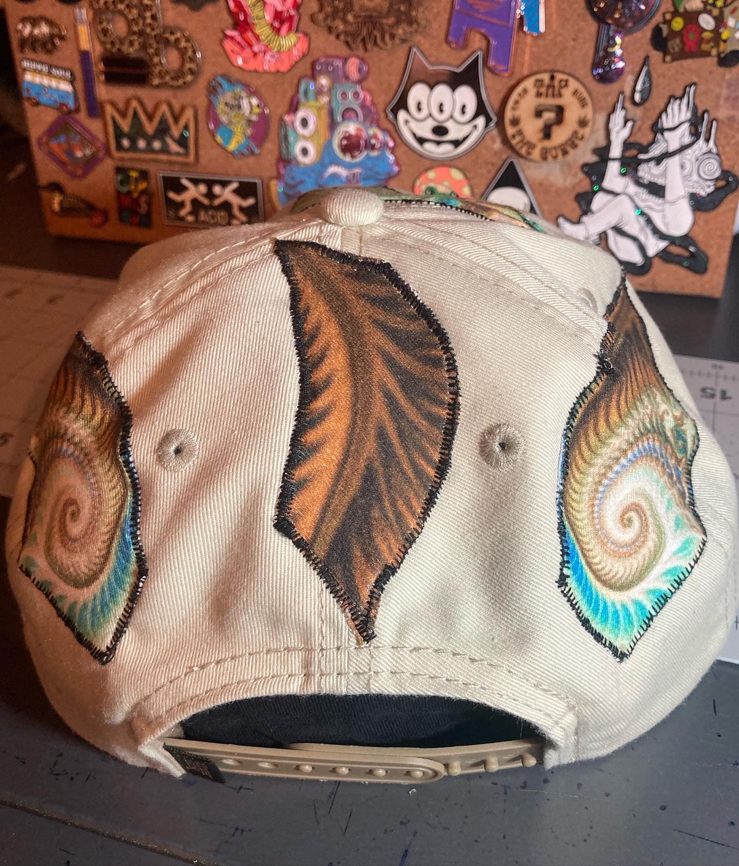 Row of hand-etched brass keyrings.